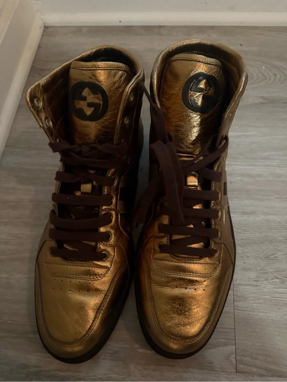 Gucci Metallic Gold High-Top Sneakers with Black Logo